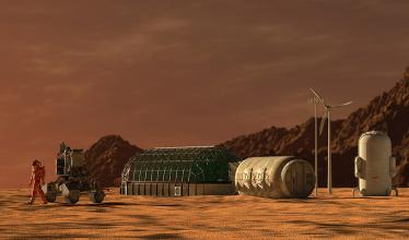 Artist's rendition of an astronaut walking on Mars, past a rover, with a greenhouse, windmill and additional buildings, with mountains in the background.