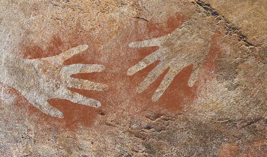 hand art in the style of prehistoric cave stencils