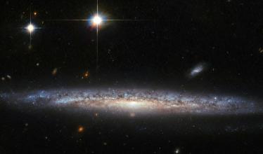 A spiral galaxy located 130 million light-years away