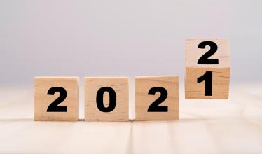 Wooden blocks turn from 2021 to 2022